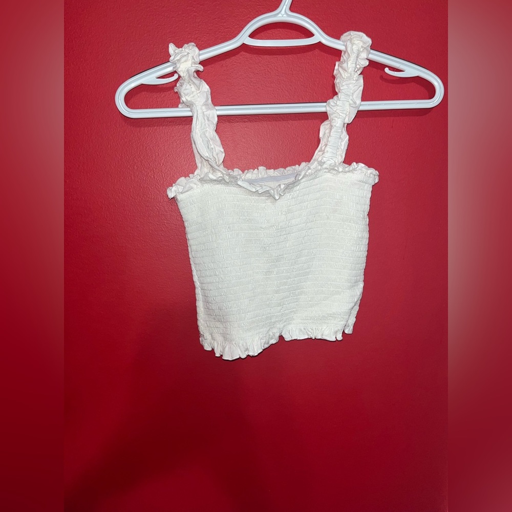 White cropped tank shirt.
